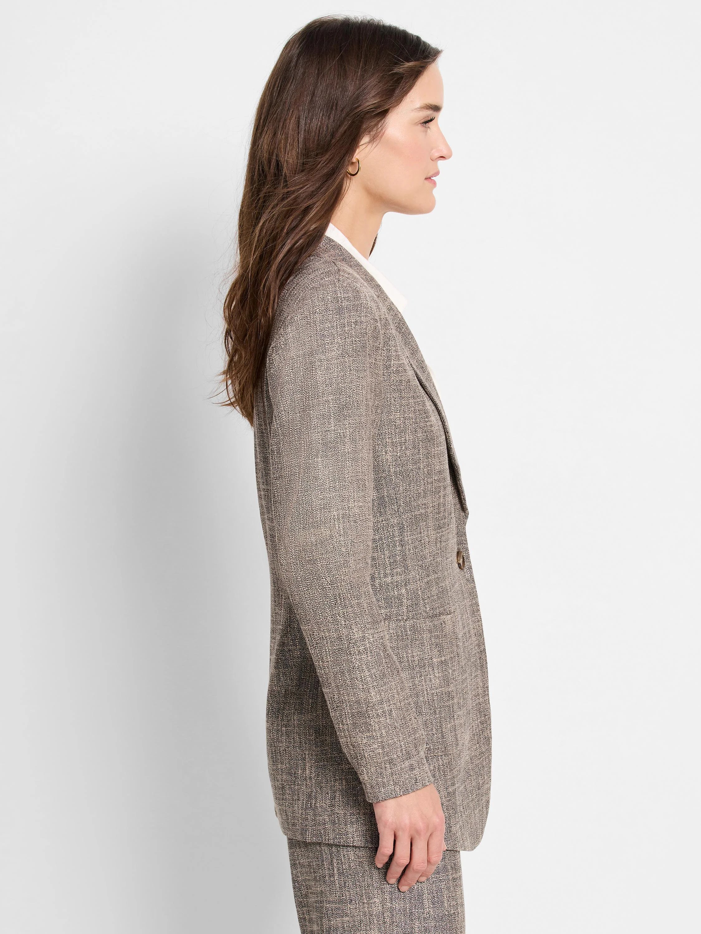 Brown tweed blazer, single button, shown in profile.  Subtle lighter flecks in fabric.