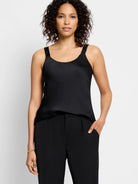 Black crepe cami with thin straps; scoop neck.
