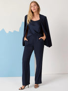 Navy blue cami and pants.  Model wears a similar-colored open blazer.