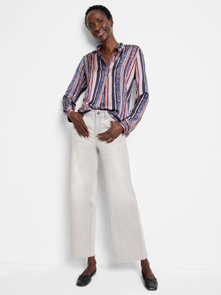 Long-sleeve button-up shirt with vertical stripes in purple, pink, orange, and brown.  Some stripes incorporate animal print.