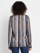 Here's alt text for the image, under 125 characters:

"Blue, beige, and brown vertical striped shirt.  Stripes...