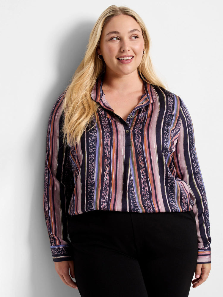 Long-sleeve button-up shirt. Vertical stripes in mauve, orange, purple, and dark teal with animal print accents on a dark...
