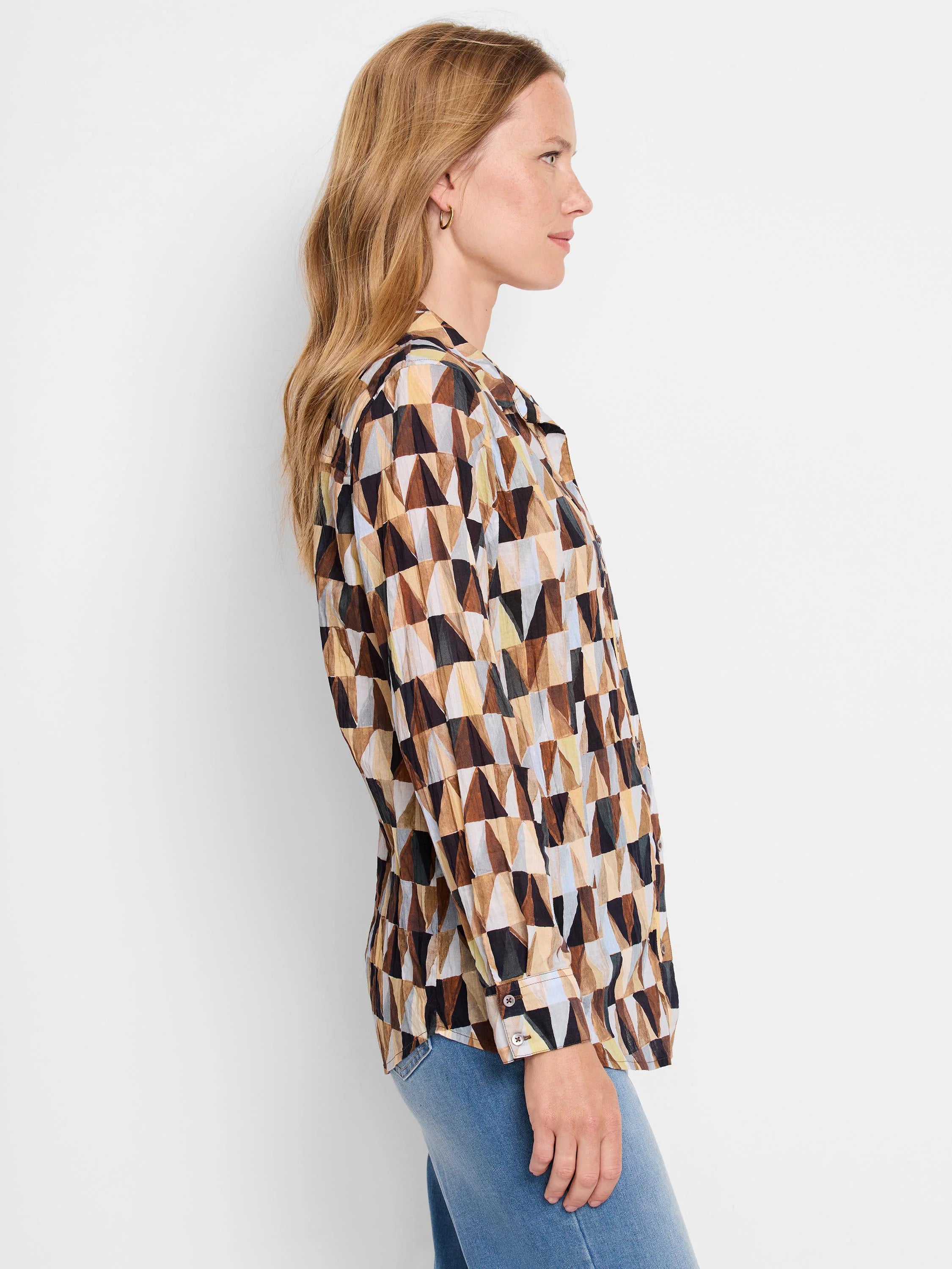 Brown, beige, and black geometric patterned shirt.  Long sleeves, collared.