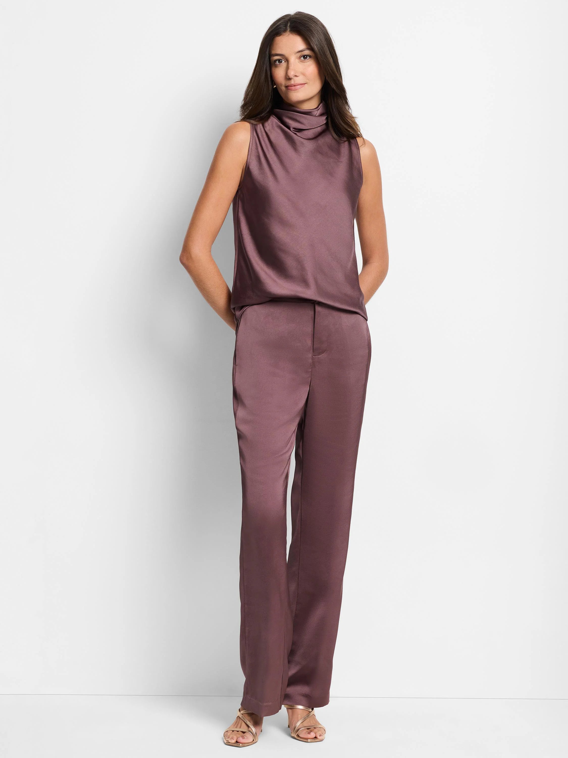 Dusty rose sleeveless satin top with cowl neck, paired with matching wide-leg satin trousers.
