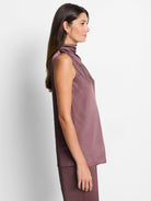 Dusty rose sleeveless satin top. High mock neck. Straight, relaxed fit.