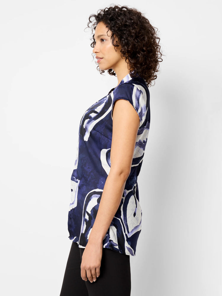 Short-sleeved top, navy blue base with off-white and purple watercolor vine print.