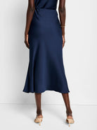 Navy blue midi-length crepe slip skirt, A-line silhouette.