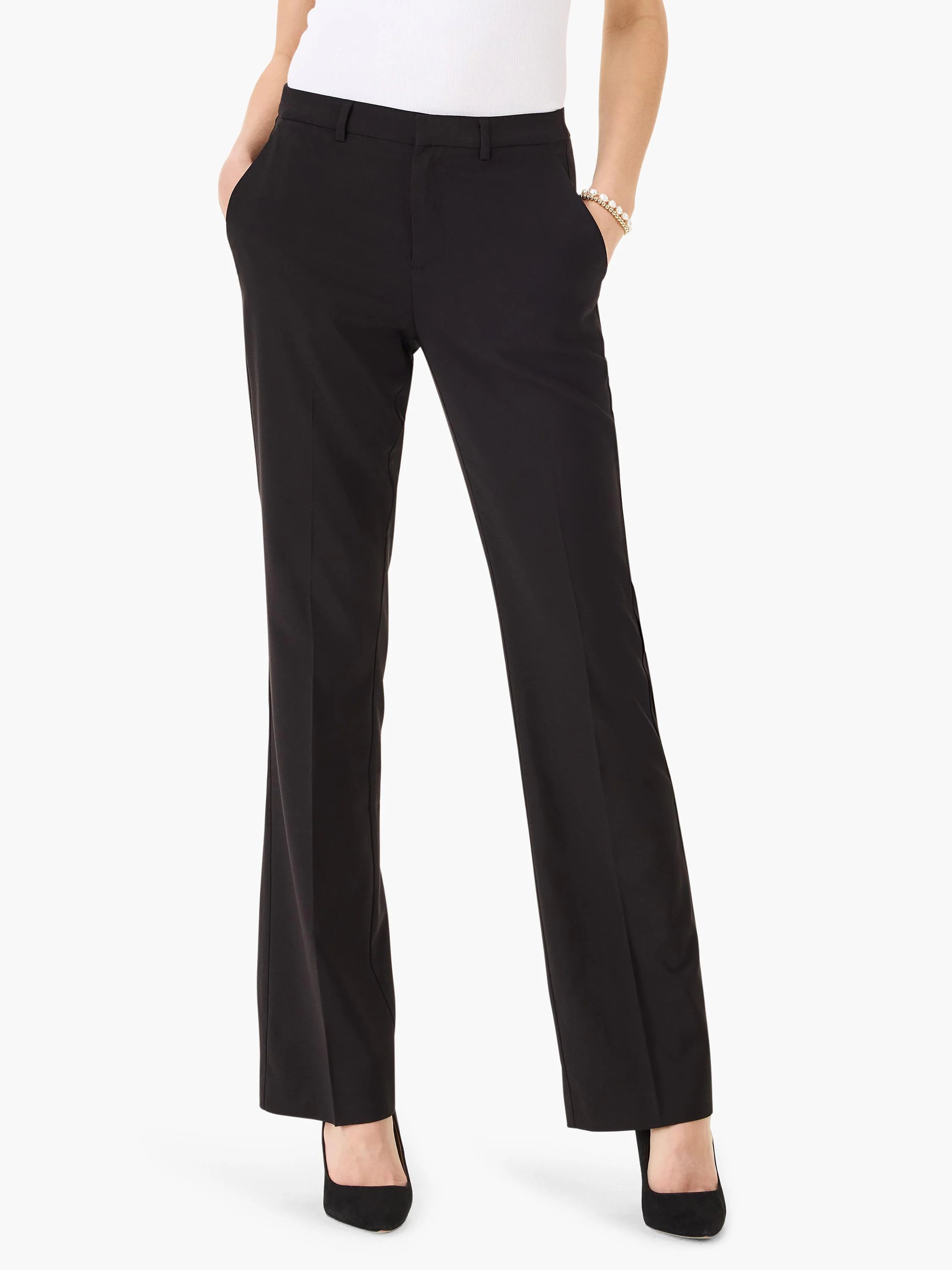 Black bootcut trousers; front view shows  straight legs that flare slightly at the ankle.  The trousers have pockets.