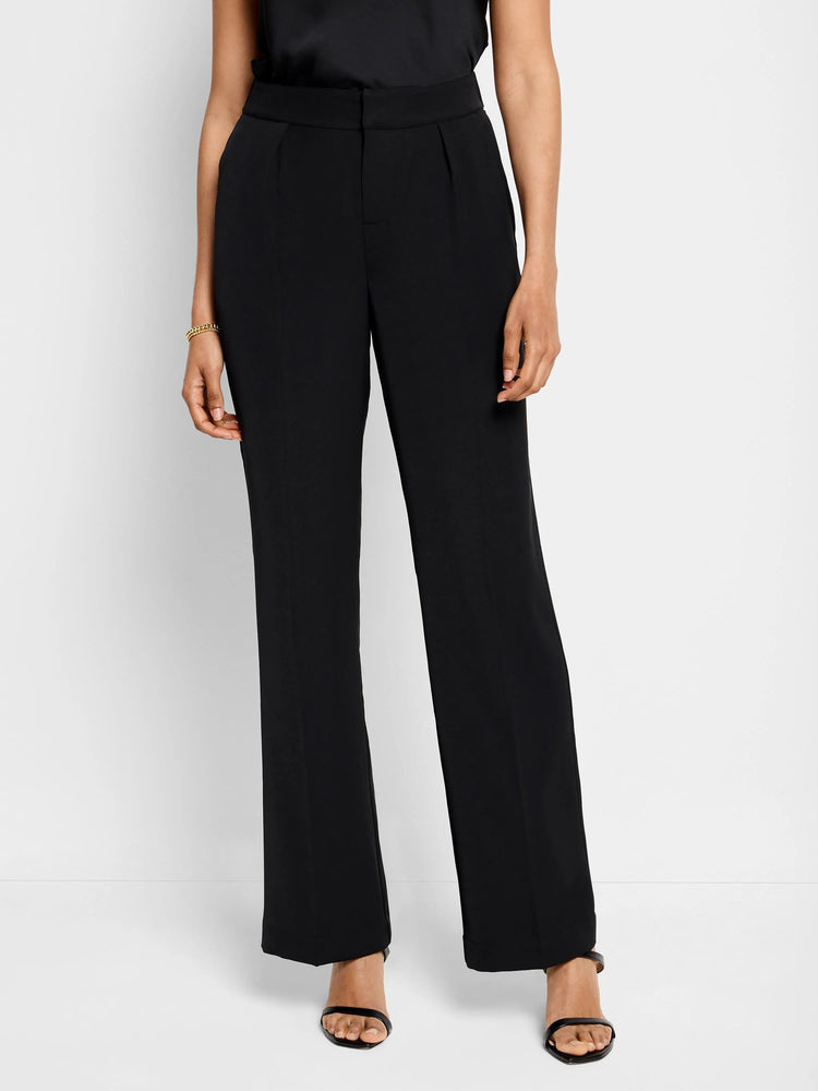 Black wide-leg trousers with center crease;  model shown wearing black shoes.