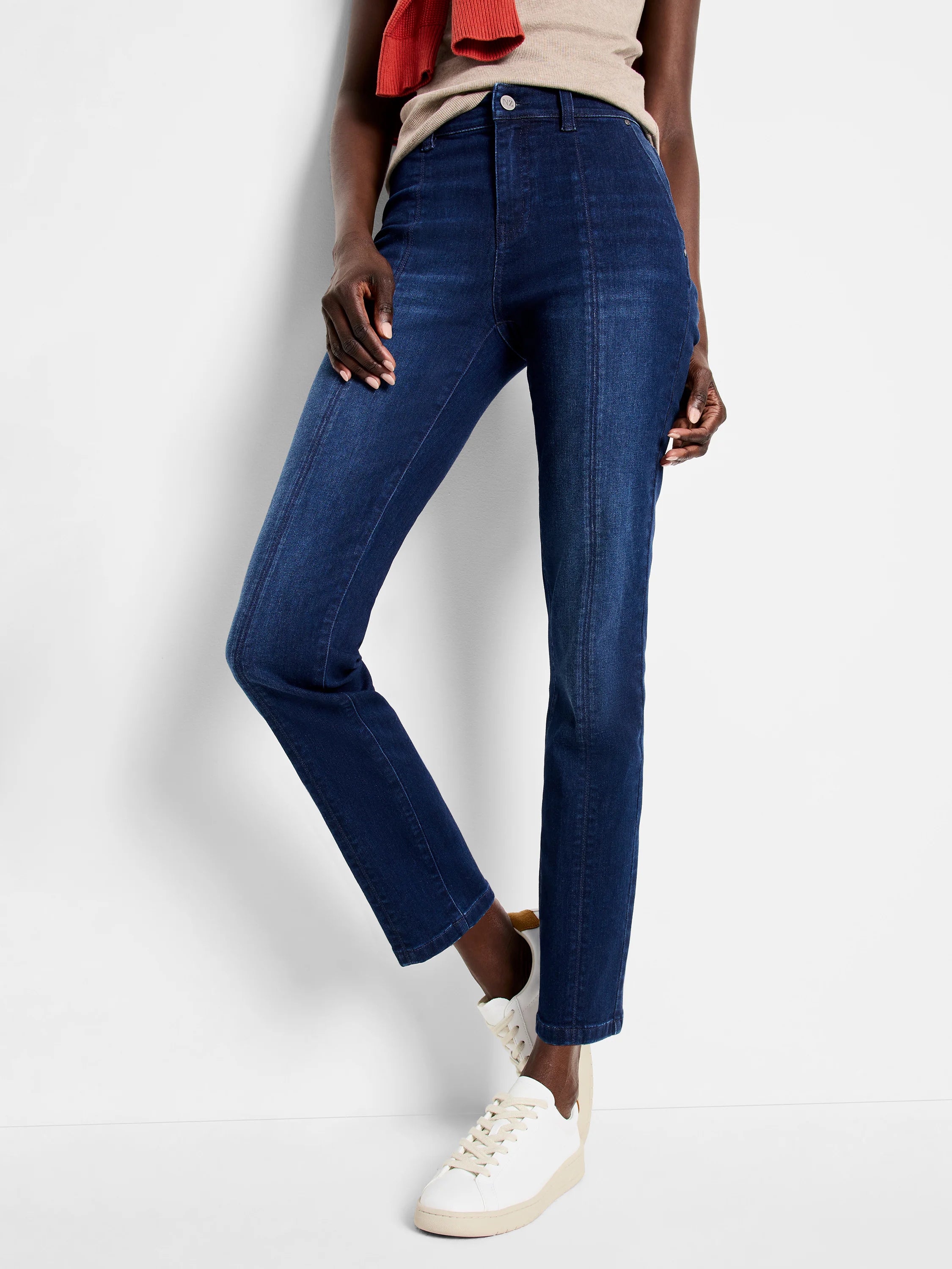 Dark wash blue straight carpenter jeans with front leg seams.