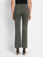 Dark olive green, cropped bootcut pants; back view.  Features include a waistband and back pockets.