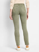 Muted olive green straight carpenter jeans, viewed from behind. Features 'M' stitching on the back pockets.