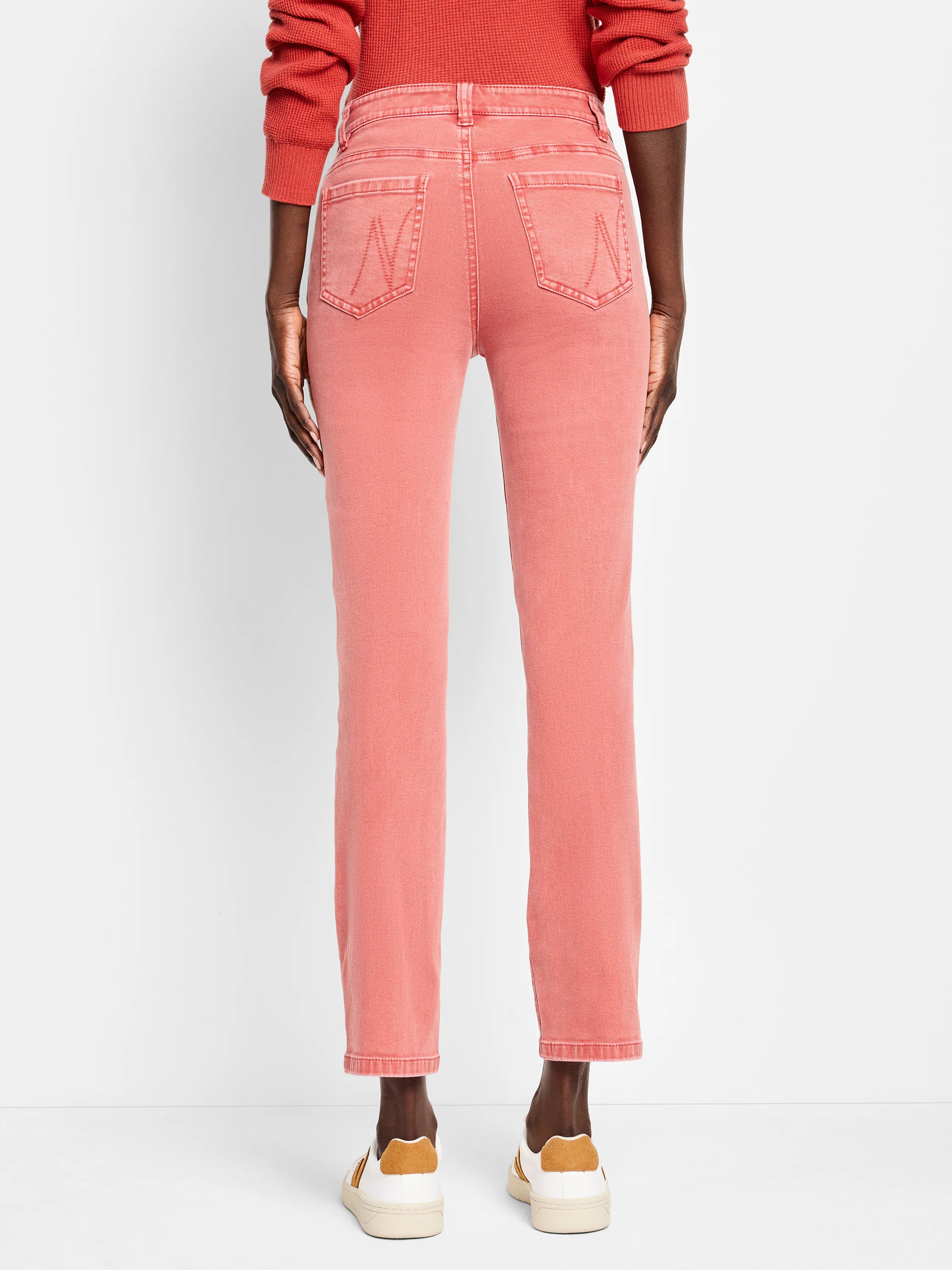 Faded coral straight ankle jeans, back view, with "W" stitched back pockets.