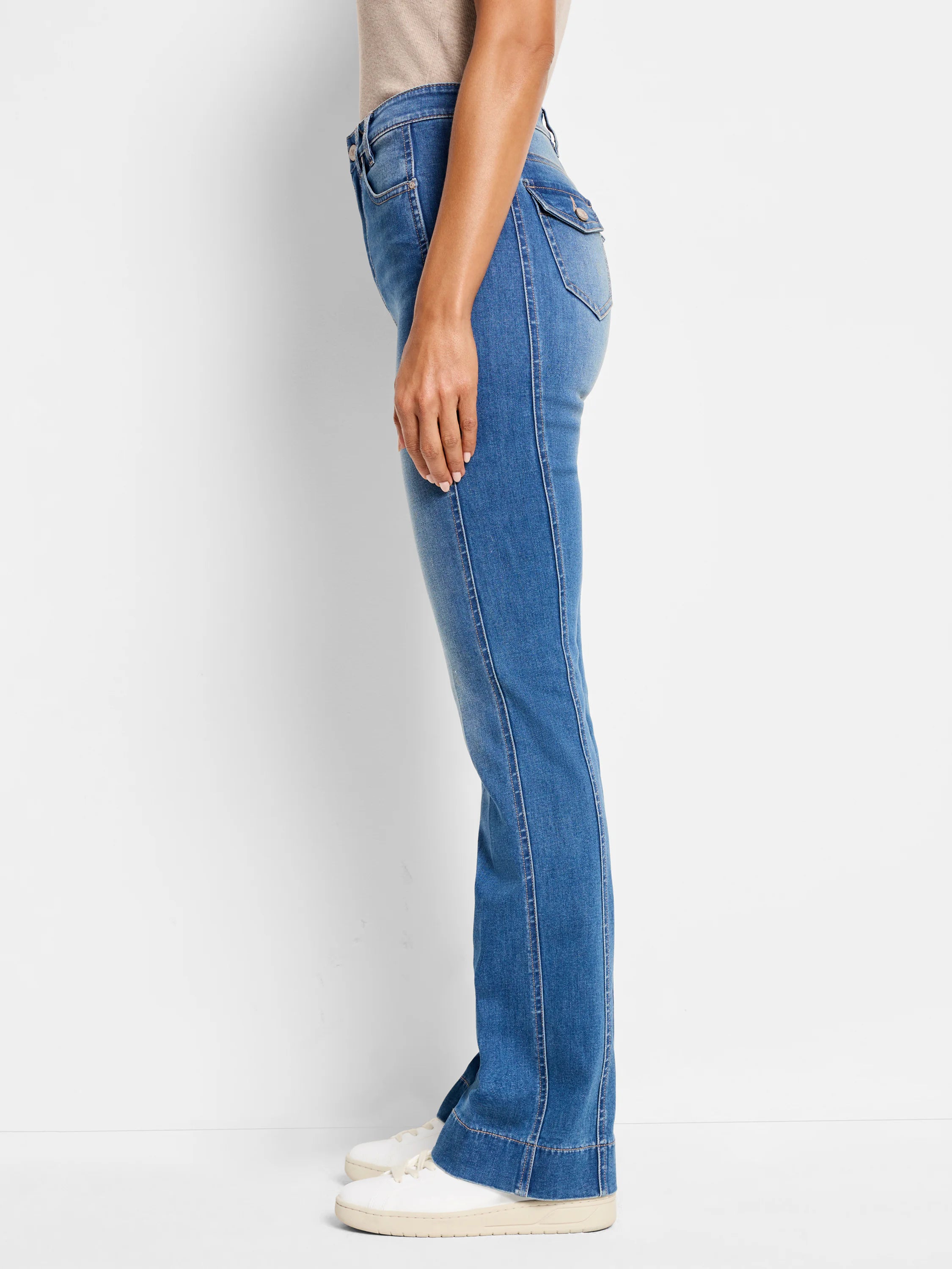 Medium blue bootcut jeans with defined side panel seams and a buttoned flap pocket on the thigh.