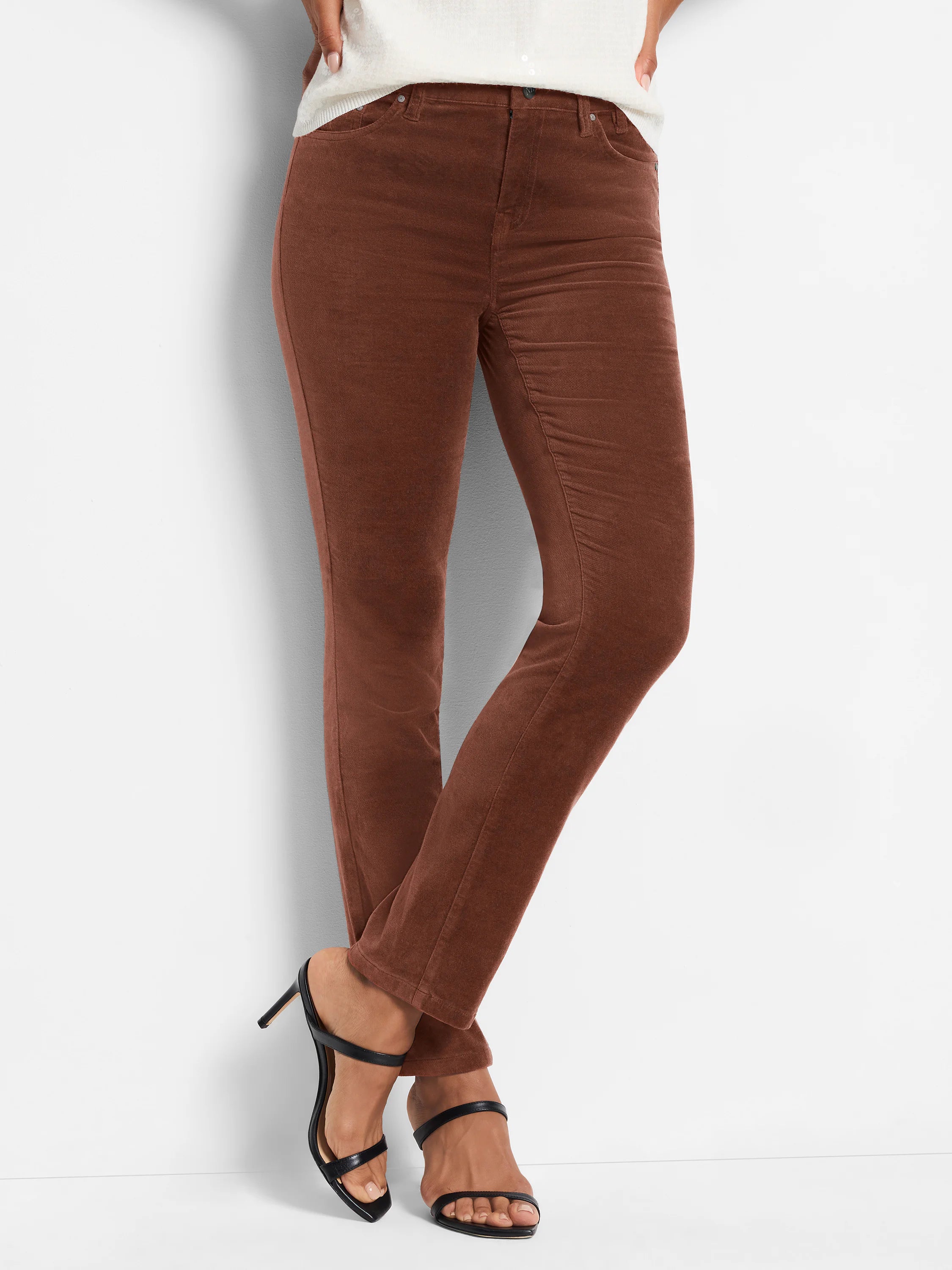 Brown velvet ankle pants; straight leg; model shown wearing them with black heels.