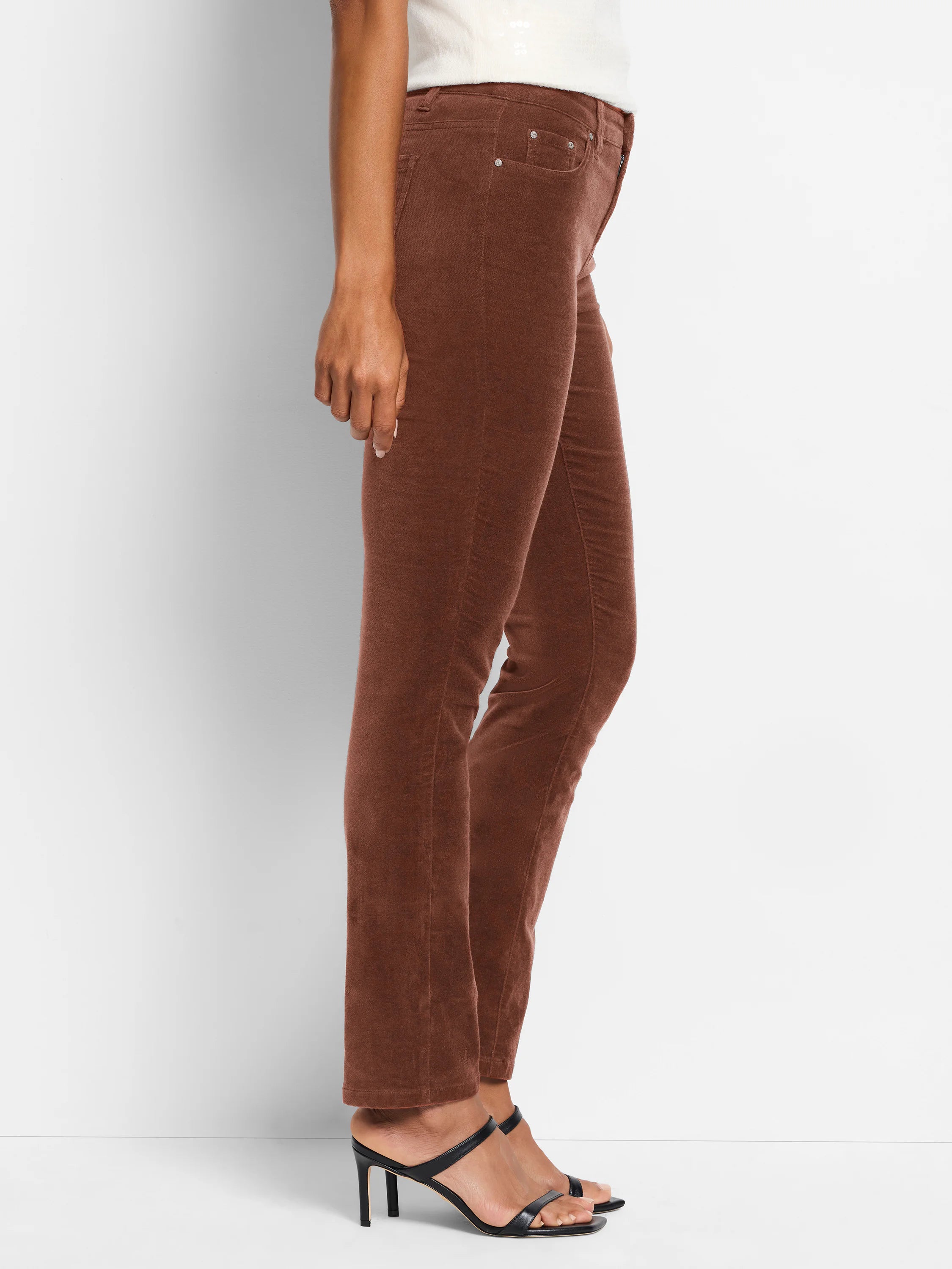 Brown velvet straight-leg ankle pants shown on a model.  The pants are a muted brownish-red.