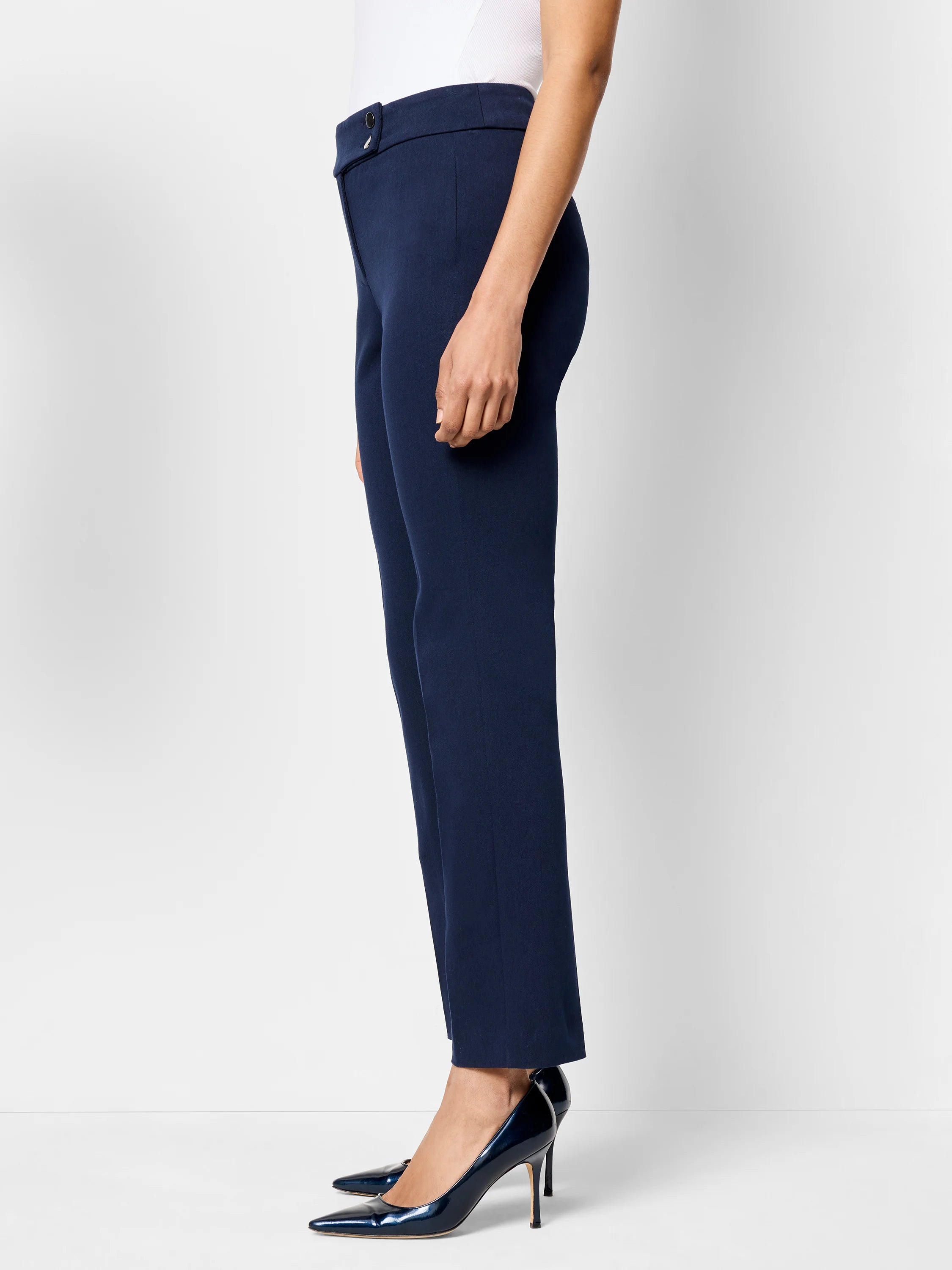 Navy blue straight-leg pants; side view shows a mid-rise waist and button closure.