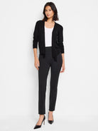 Black slim-leg pants;  straight,  ankle-length.  Model is wearing them with a black cardigan and white top.