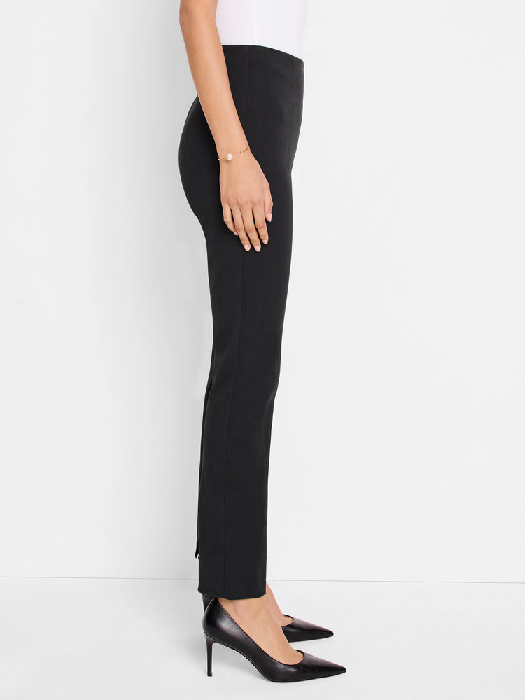 Black slim-leg pants; side profile shows a pull-on style.