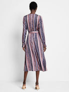 Midi dress, purple, pink, orange, and beige vertical stripes; animal print accents.  Long sleeves, belted waist.