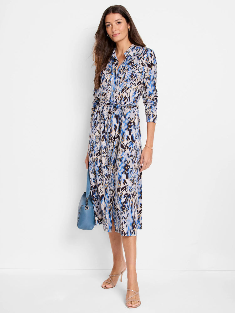 Midi shirt dress, belted, in blue, beige, and brown chevron print.  Long sleeves.