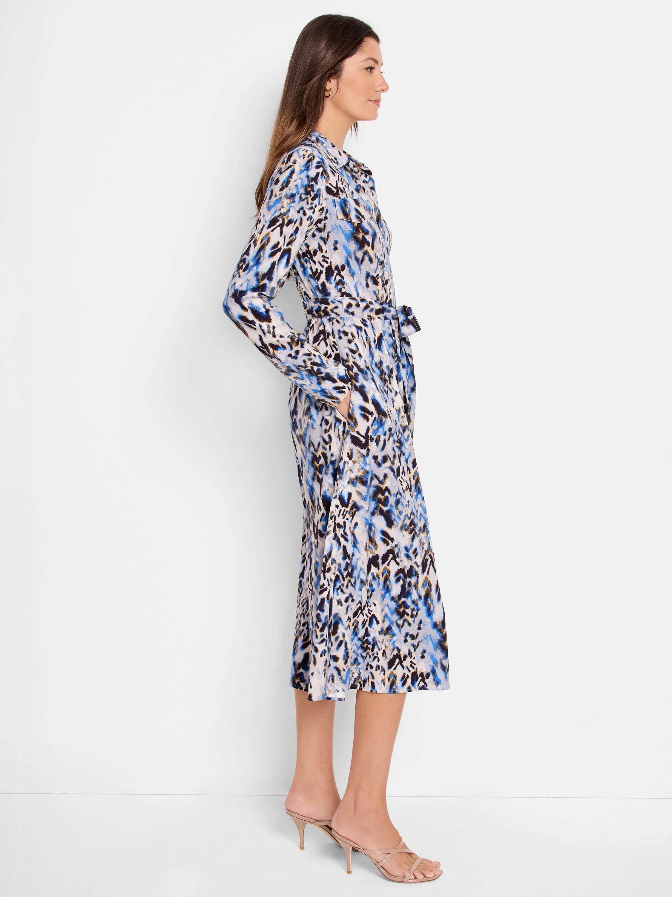 Midi-length shirt dress, belted. Blue, brown, and beige chevron print.  Long sleeves.