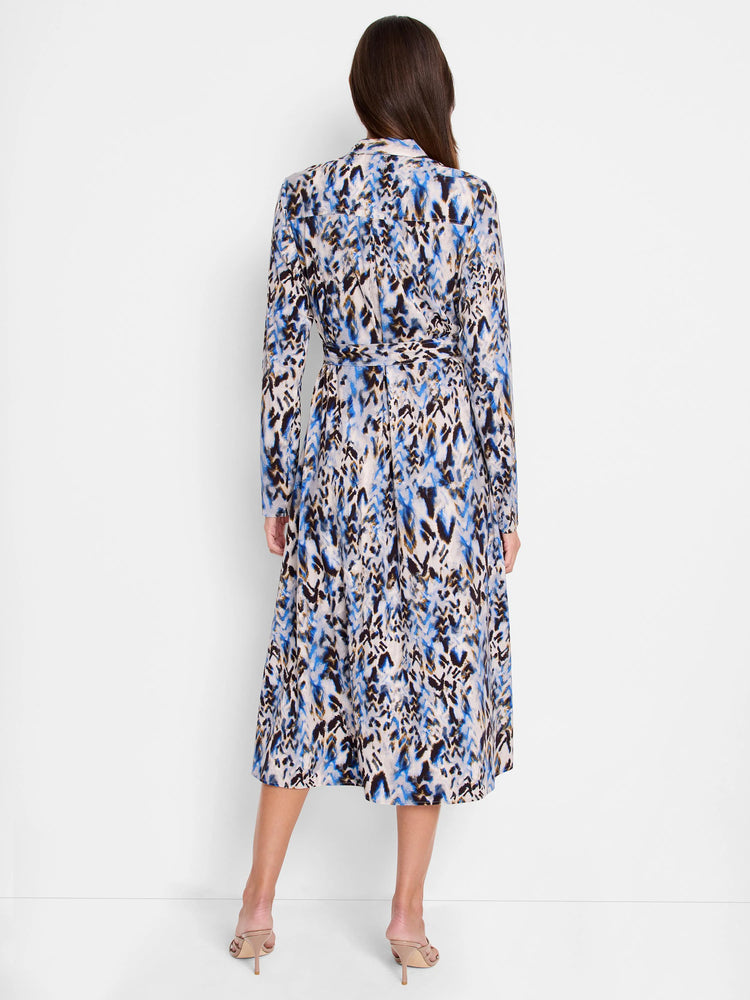 Long midi dress, belted waist, chevron print in blue, beige, and brown.  Long sleeves, collared neckline.