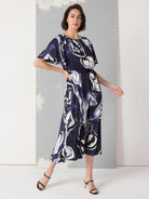 Midi dress, navy & white abstract watercolor print, flutter sleeves, belted waist.