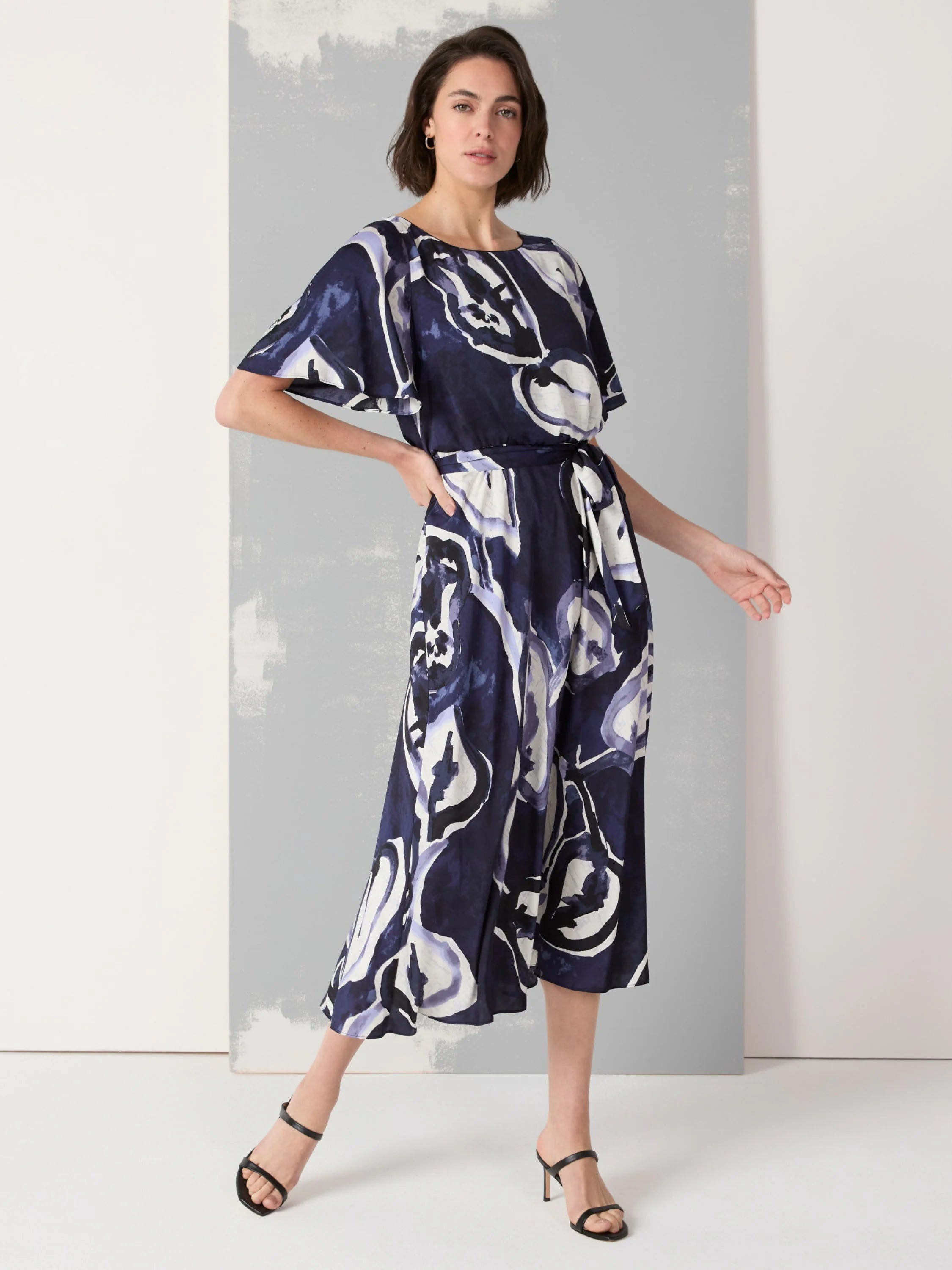 Midi dress, navy & white abstract watercolor print, flutter sleeves, belted waist.