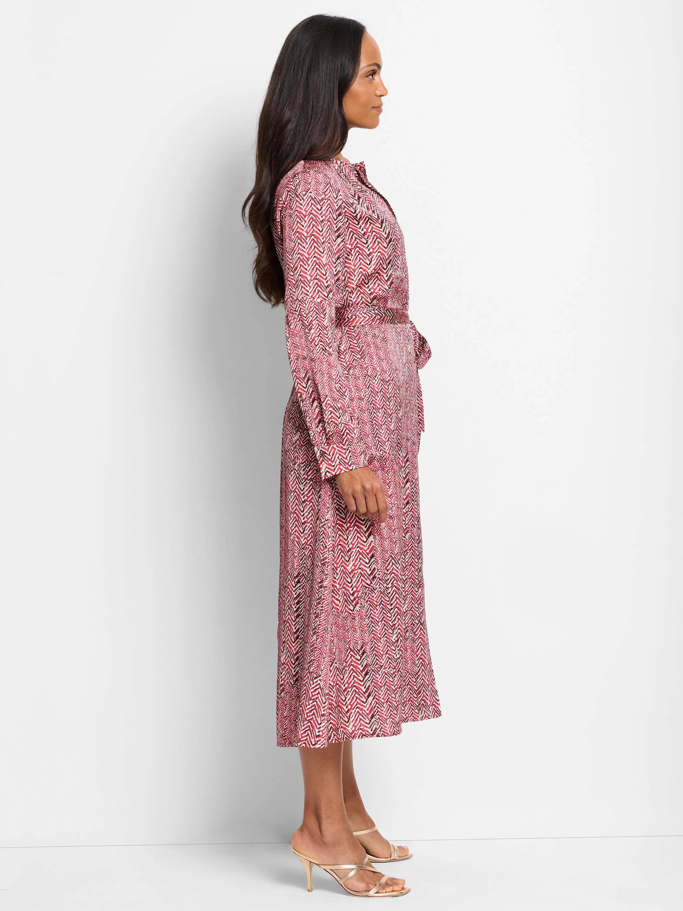 Red and cream herringbone midi dress with long sleeves and tie waist.