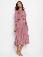 Red midi dress with a herringbone pattern in black and white.  Three-quarter sleeves, belted waist, and a front button...