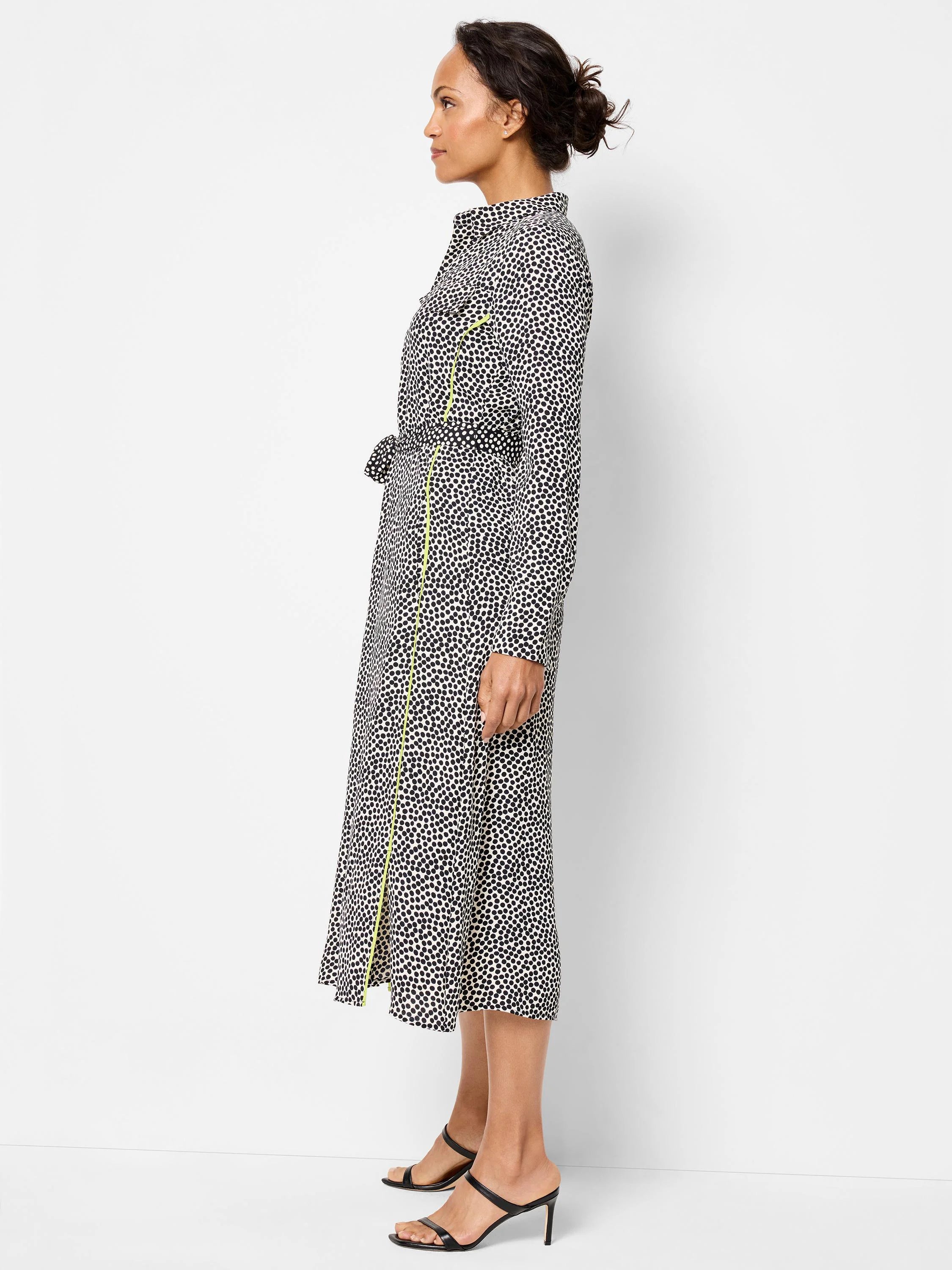 Black and white spotted midi shirt dress with a lime green side trim and self-tie belt.