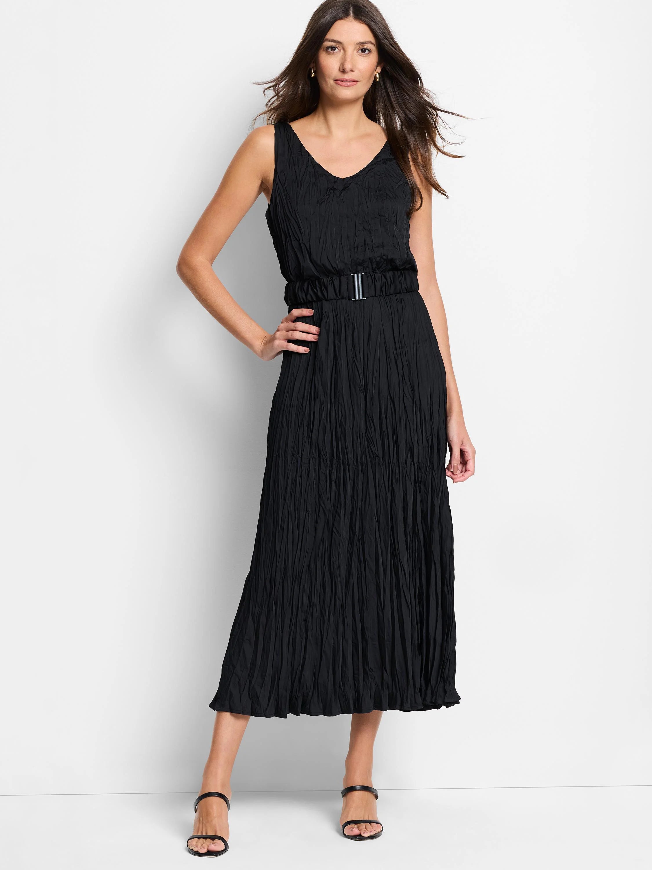 Black midi dress, sleeveless, V-neck, belted waist, textured fabric with vertical pleats.