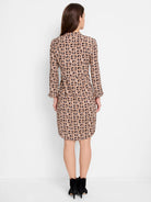 Brown midi dress, black & white geometric print, three-quarter sleeves.  Rear view.