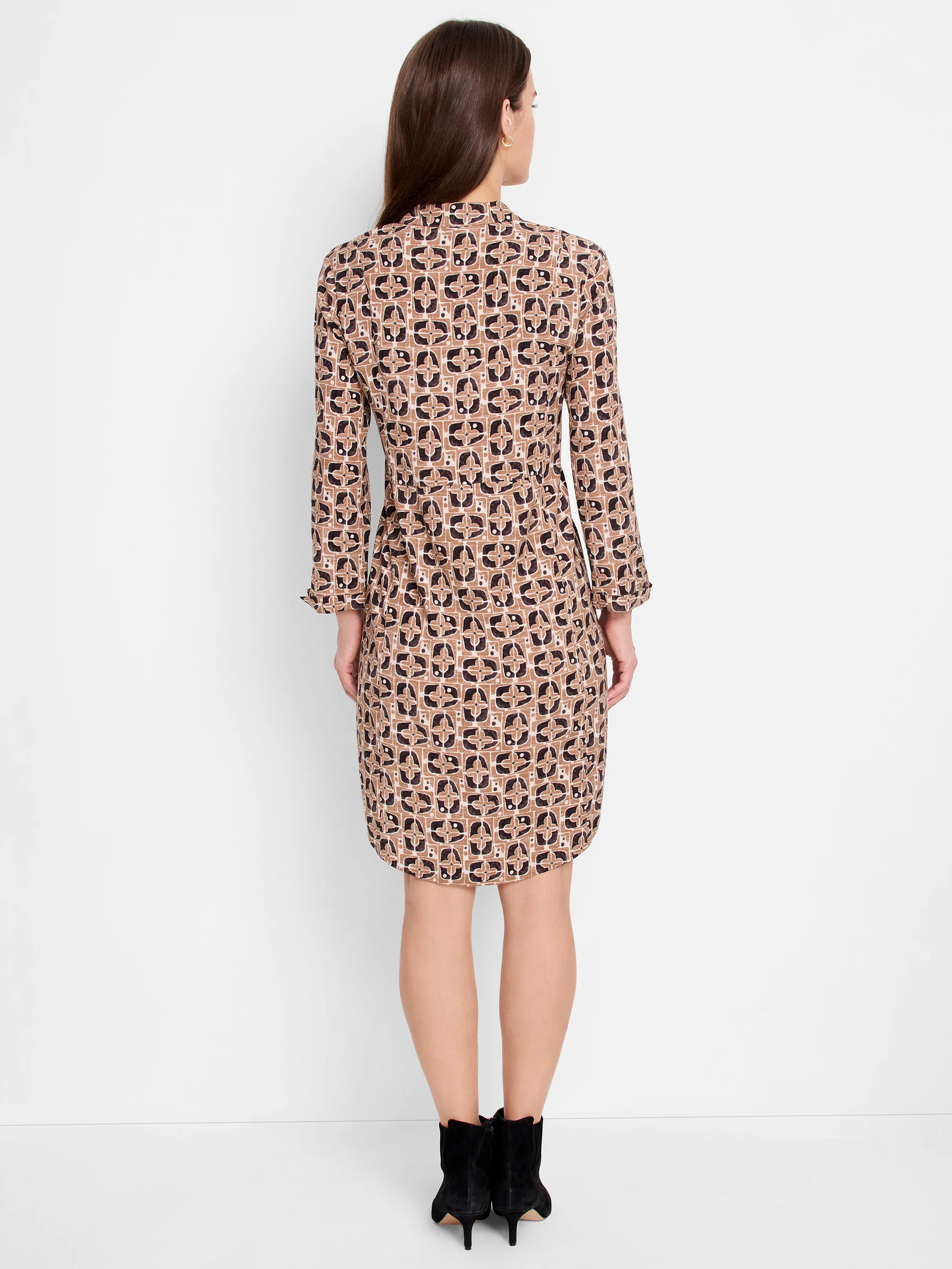 Brown midi dress, black & white geometric print, three-quarter sleeves.  Rear view.