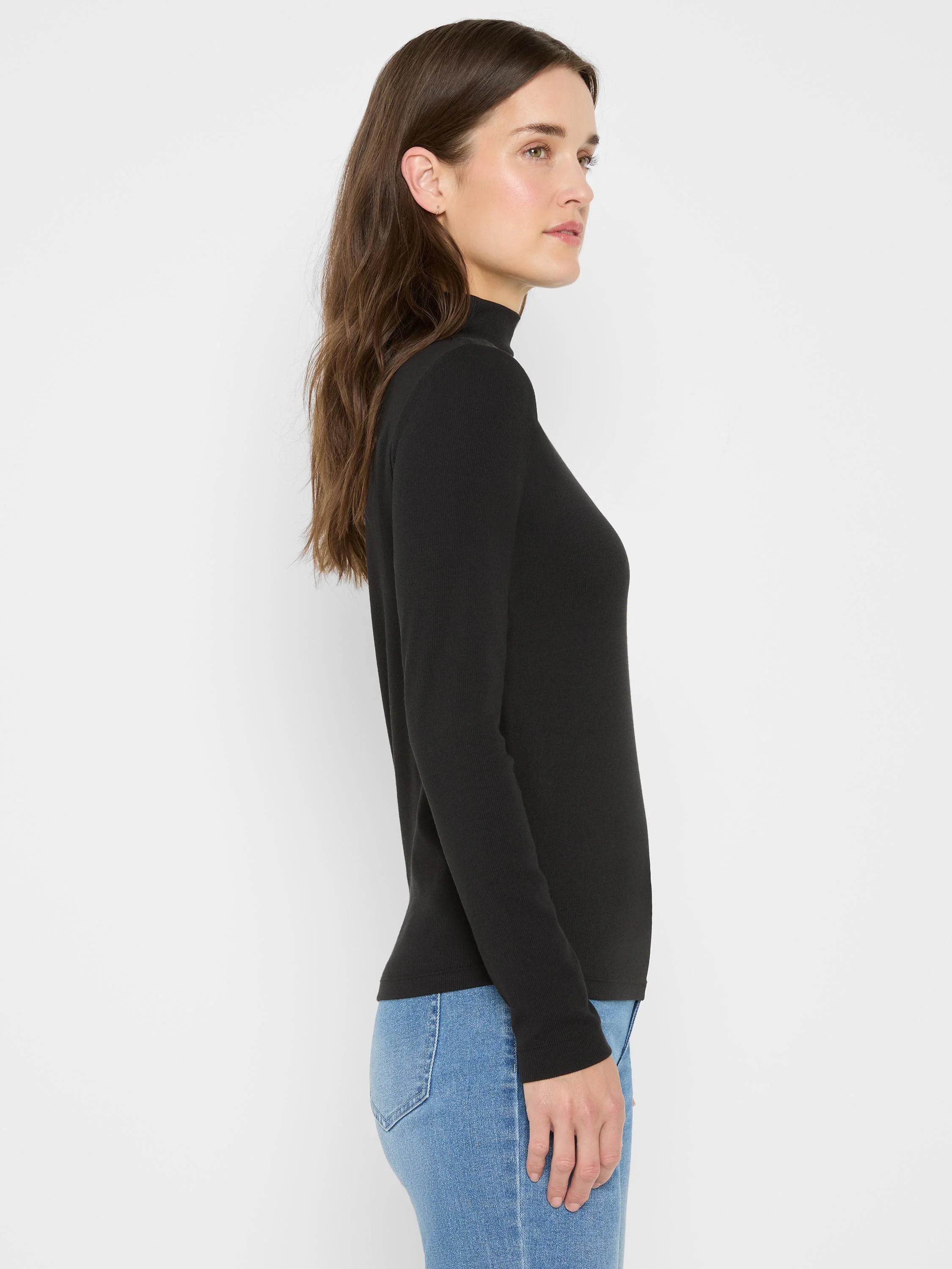 Black ribbed knit long sleeve mock neck tee on a model, with a close-fitting silhouette.