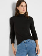 Black ribbed long sleeve mock neck tee.