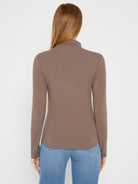 Brown ribbed knit long sleeve mock tee, back view, showing fitted shape.