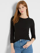 Black, ribbed knit long-sleeve tee with a crew neck and a fitted silhouette.