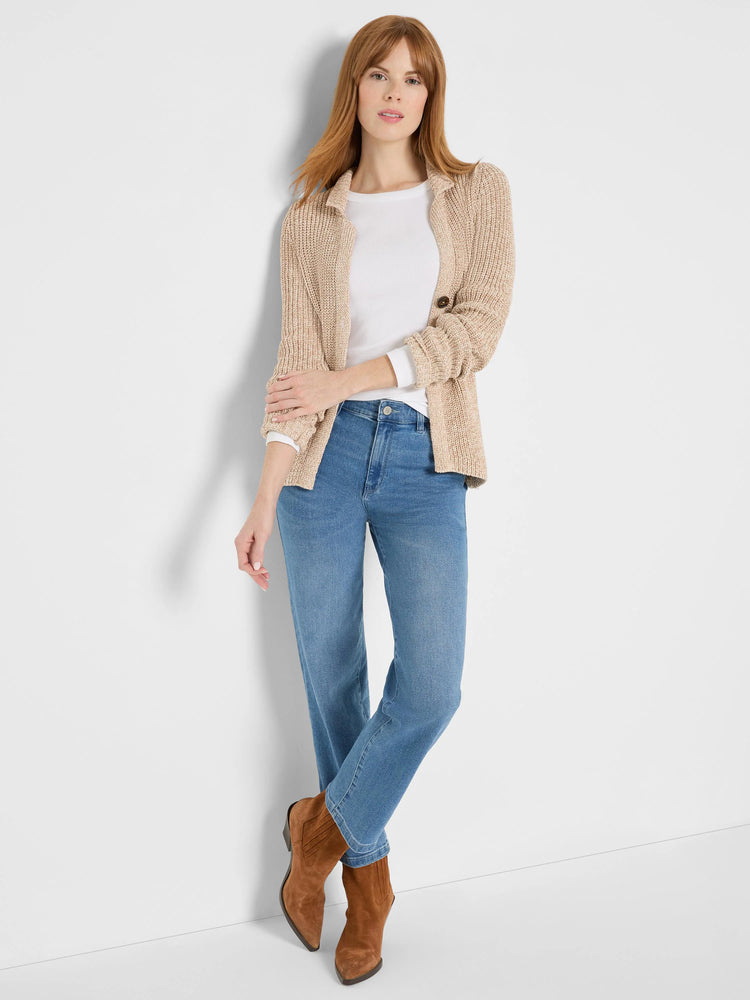White rib-knit long sleeve crew neck tee worn by a model under a light brown cardigan.