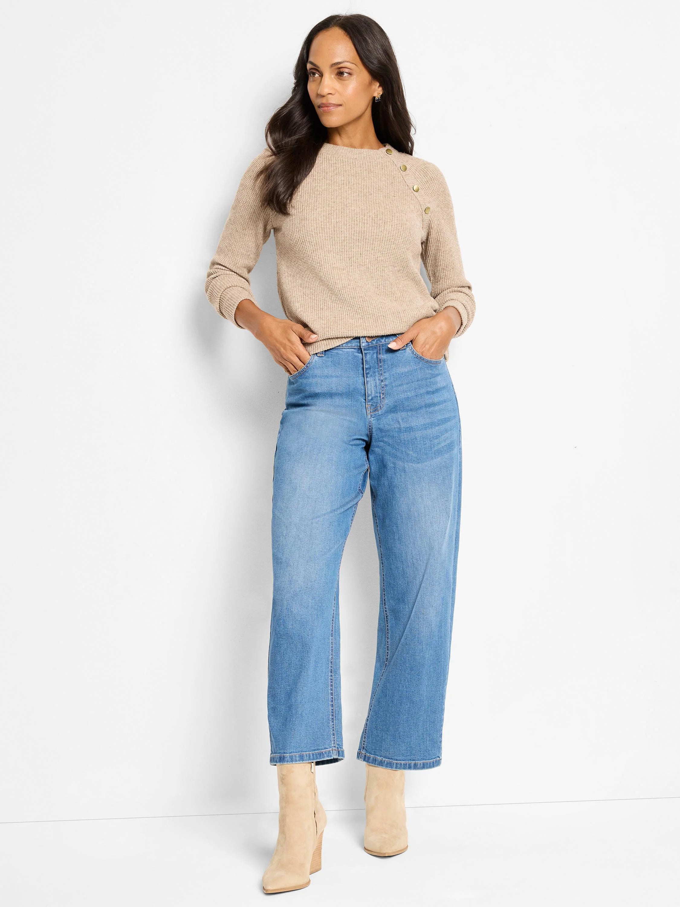 Light tan thermal waffle-knit top with a round neck and gold-toned buttons on the left shoulder.