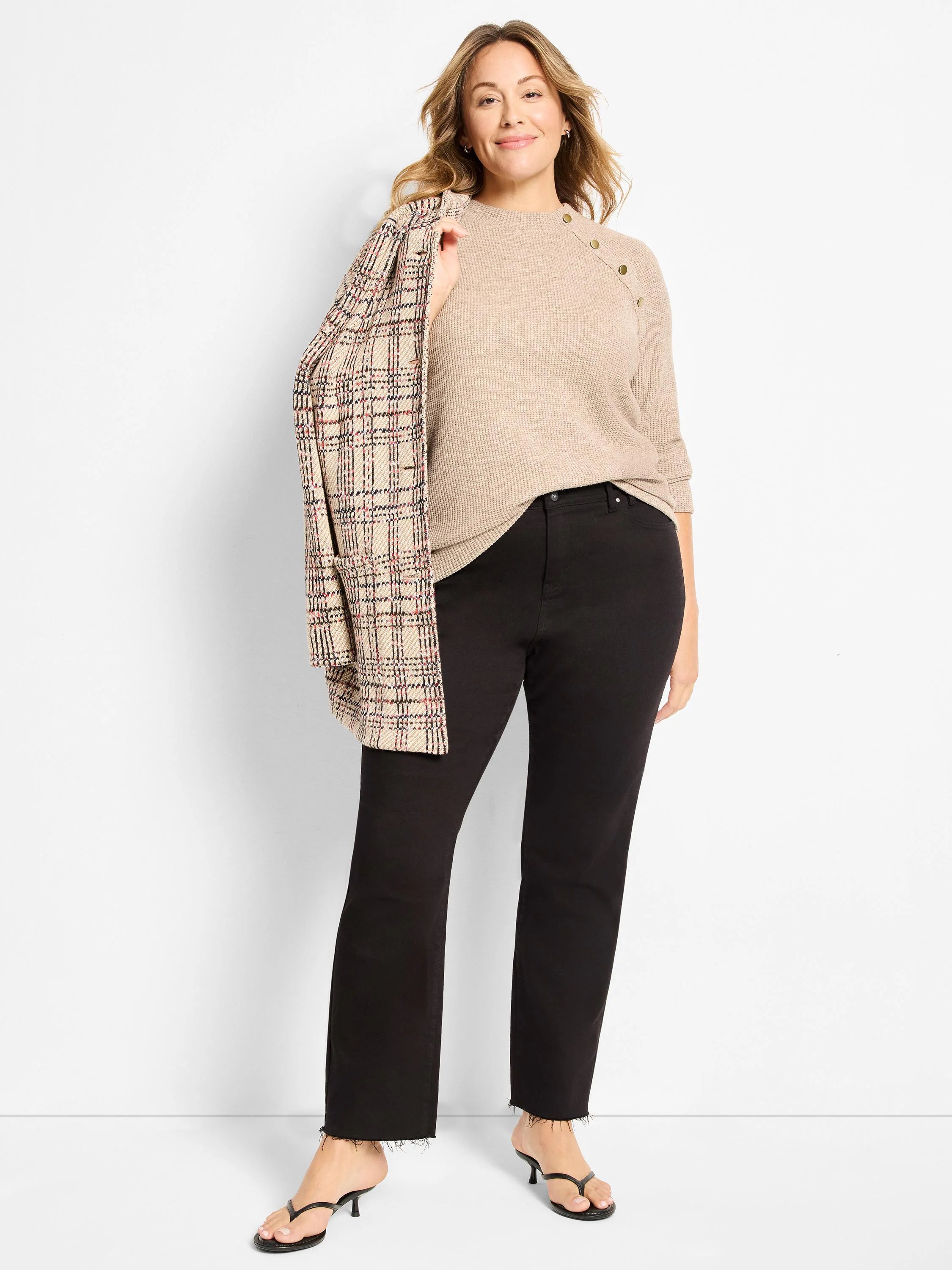 Beige ribbed thermal top with gold buttons on the shoulder.