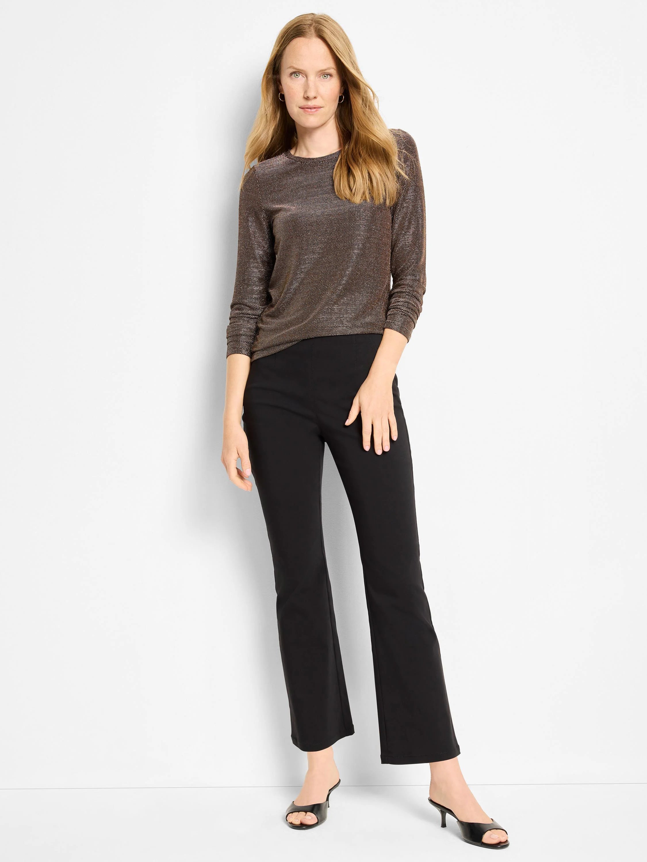Bronze knit top with shimmering metallic flecks, long sleeves, and a round neckline.