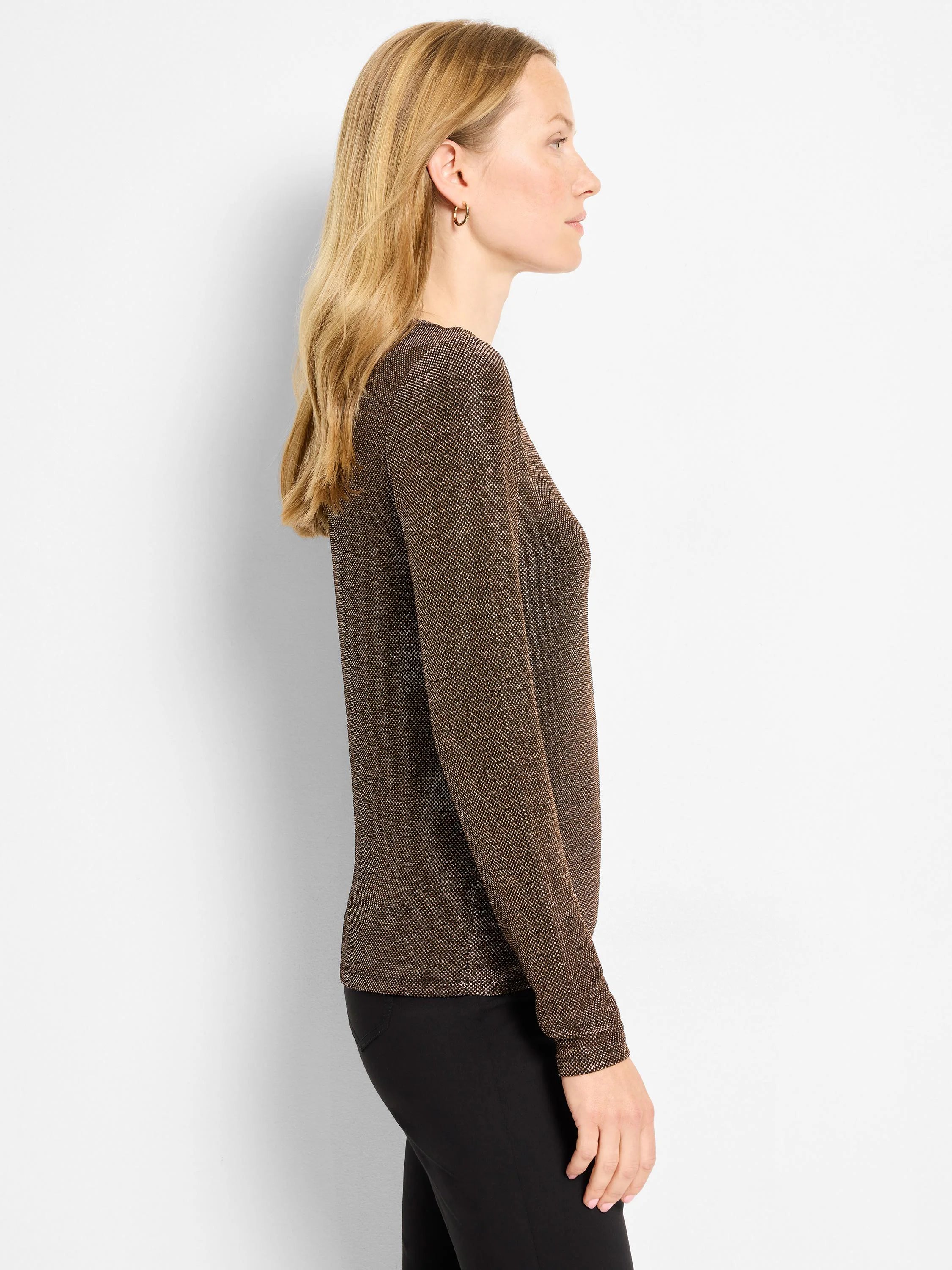 Fitted, long-sleeve top in shimmering bronze-brown knit. Model shown in profile.