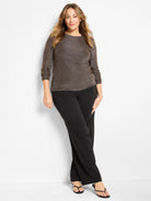 Bronze knit top with gold speckled shimmer, long sleeves, and a crew neck.