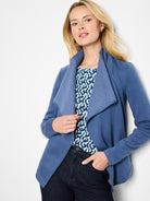 Blue open-front jacket with wide, draped lapels. Soft knit texture, long sleeves.