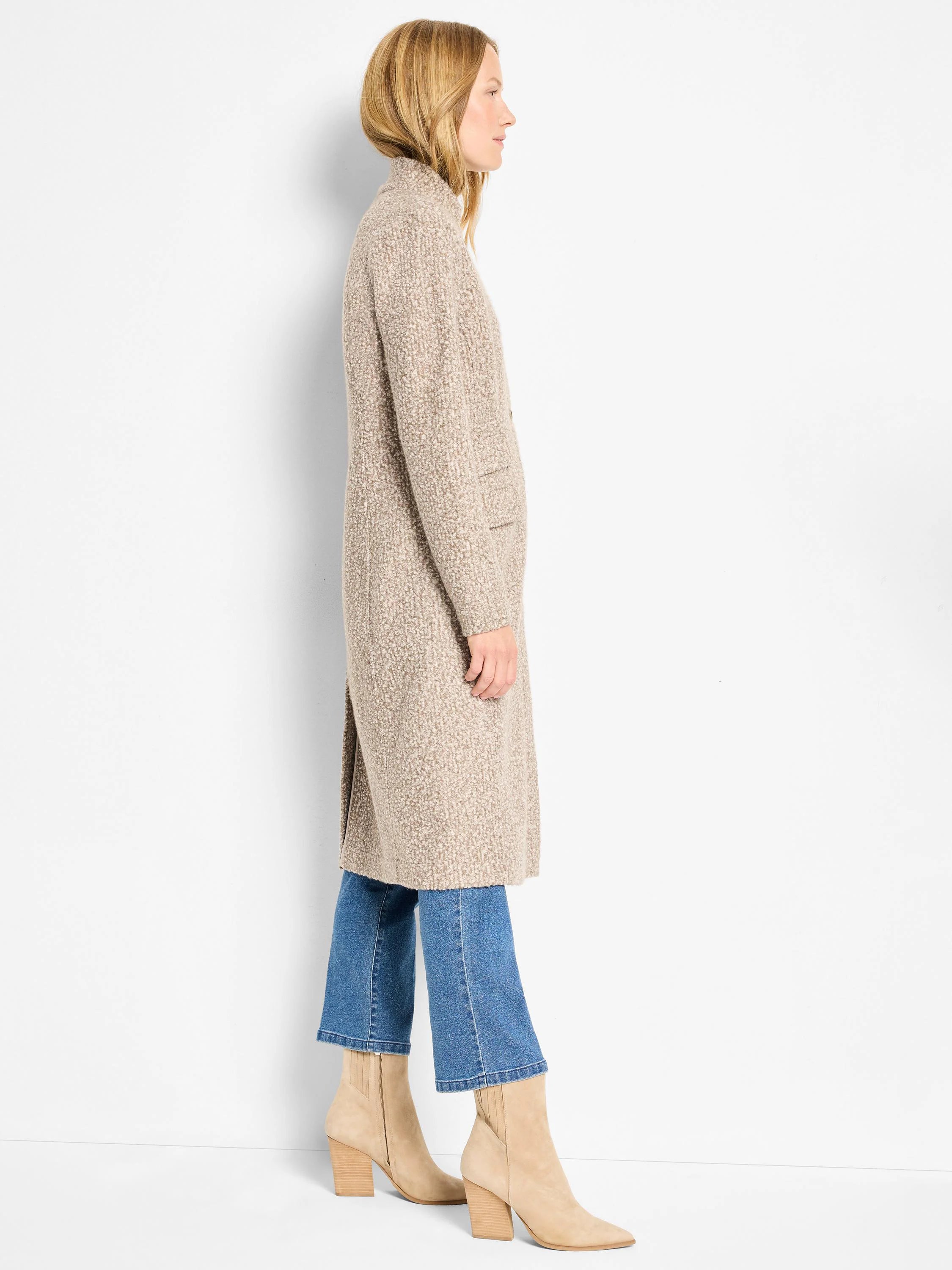 Light beige tweed knit topcoat, long length, textured sherpa-like appearance, with side pockets.