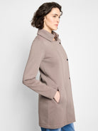 Taupe mid-length jacket with stand collar, black button closure, and in-seam pockets.