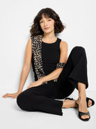 Black ribbed knit tank top with a scoop neck and smooth trim along the neckline and armholes.