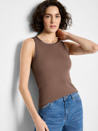 Brown ribbed tank top with a scoop neck and darker, shiny trim on the neckline and armholes.